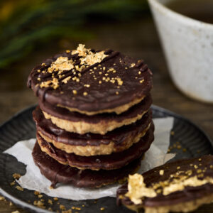 Chocolate dipped oat crumble cookies